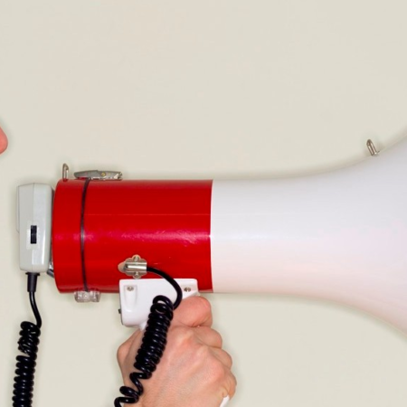 Businessman Speaking Through Megaphone